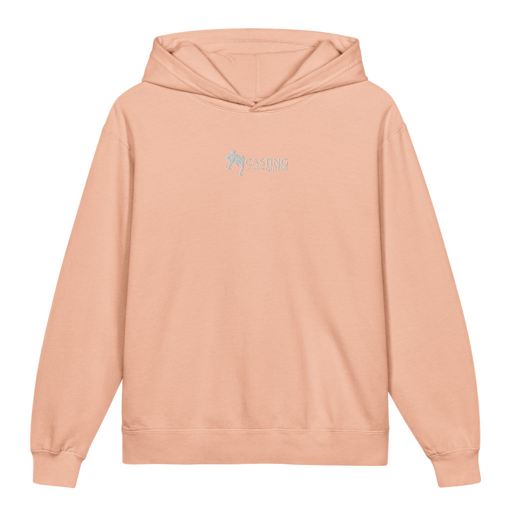 Peach embroidered Casting Queens youth fishing hoodie featuring minimalist fish logo design, cozy outdoor fishing apparel for young anglers and everyday casual wea