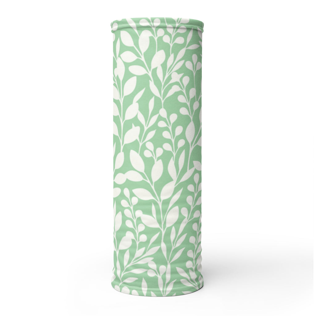 Expanded mint green Casting Queens fishing neck gaiter displaying full white floral pattern design, breathable women’s fishing face cover for sun protection and outdoor wear.
