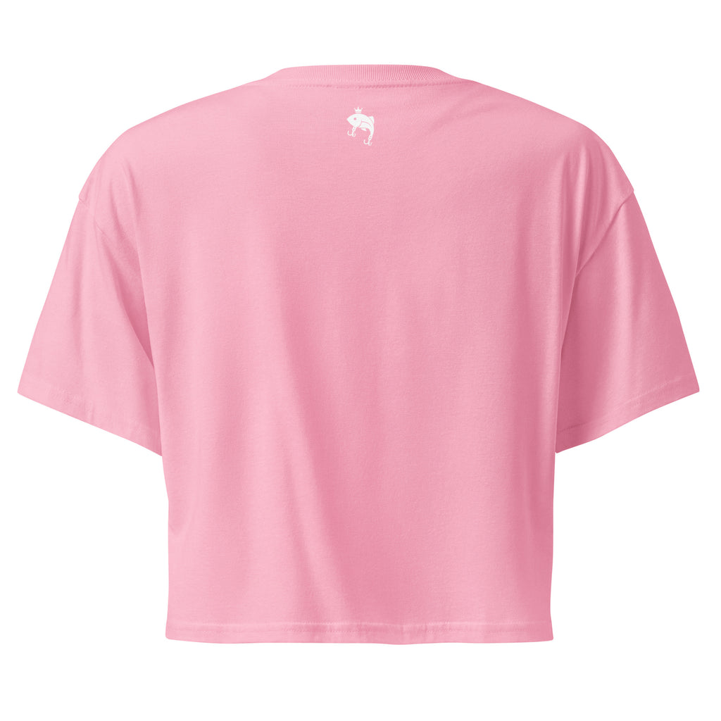 Pink women’s fishing crop top with a plain back and small minimalist Casting Queens logo detail centered below the collar.