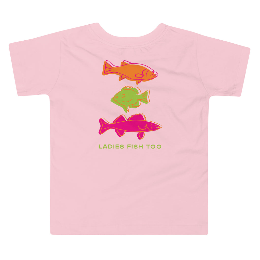 Pink toddler fishing t-shirt featuring large colorful retro fish graphics and “Ladies Fish” text on the back designed for little lake girls and outdoor adventures.
