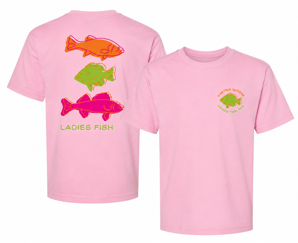 Light pink youth fishing t-shirt featuring a small colorful Casting Queens Ladies Fish Too logo on the front chest and bright retro fish artwork on the back with lake life style.