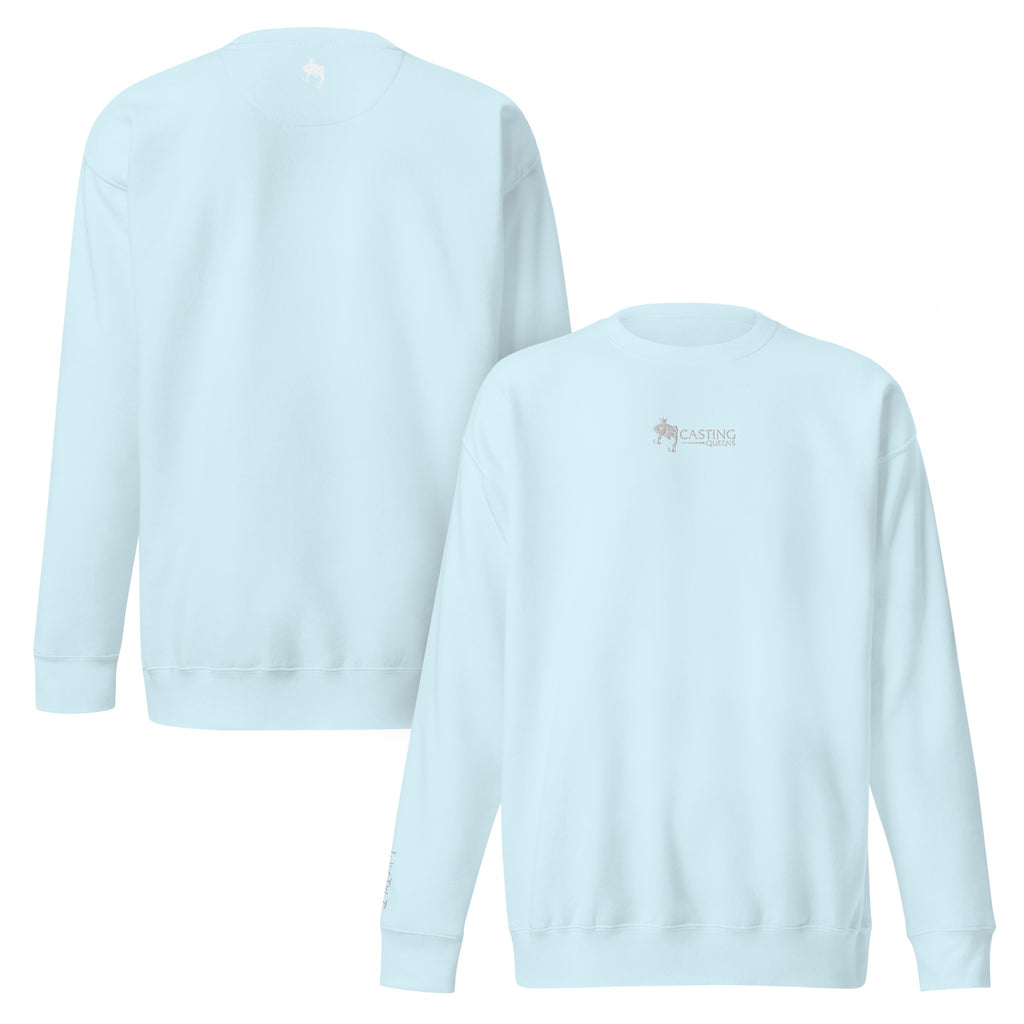 Light blue embroidered Casting Queens women’s fishing crewneck sweatshirt featuring minimalist fish logo design, cozy outdoor fishing apparel for women anglers and everyday lake life wear.