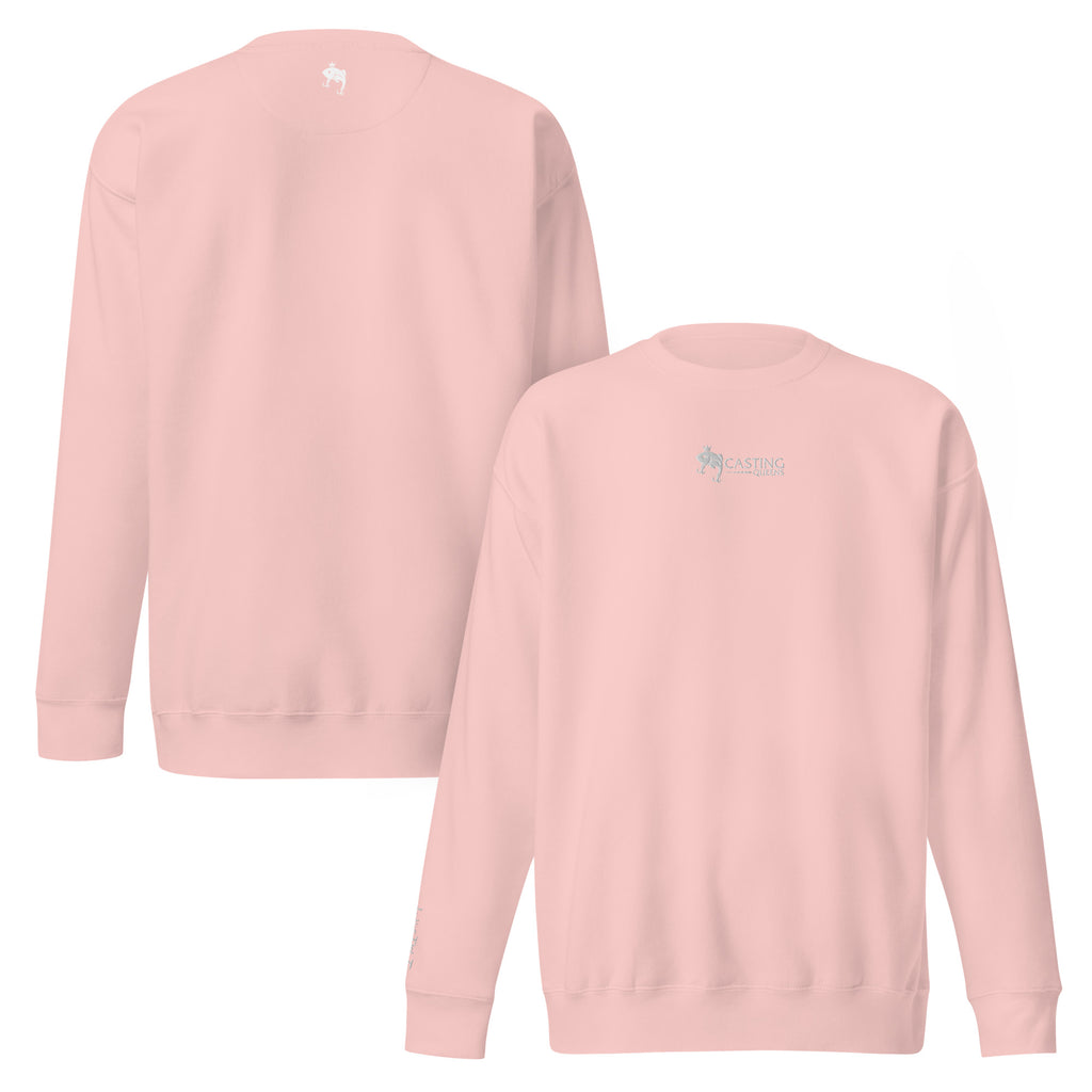 Peach embroidered Casting Queens women’s fishing crewneck sweatshirt featuring minimalist fish logo design, soft outdoor fishing apparel for women anglers and everyday casual style.